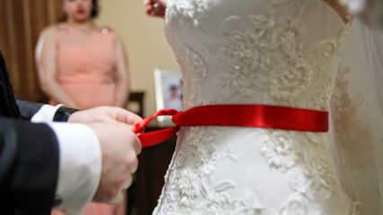 Jaký je význam červené pásky? Proč je červený pás svázán s nevěstou?