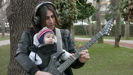Metin Türkcan a jeho dítě