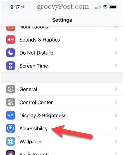 Na obrazovce Nastavení iPhone klepněte na Přístup