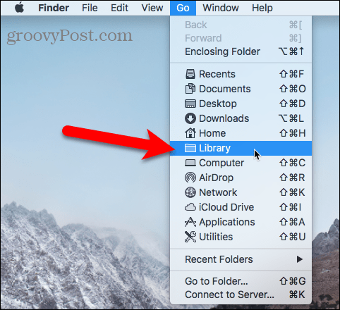 Otevřete složku Knihovna pomocí nabídky Přejít v aplikaci Finder v systému Mac